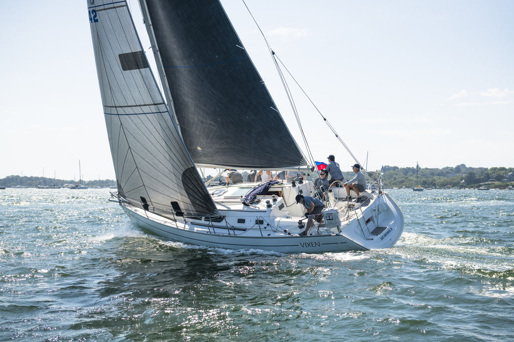 Douglas sailing on a boat with 8 others